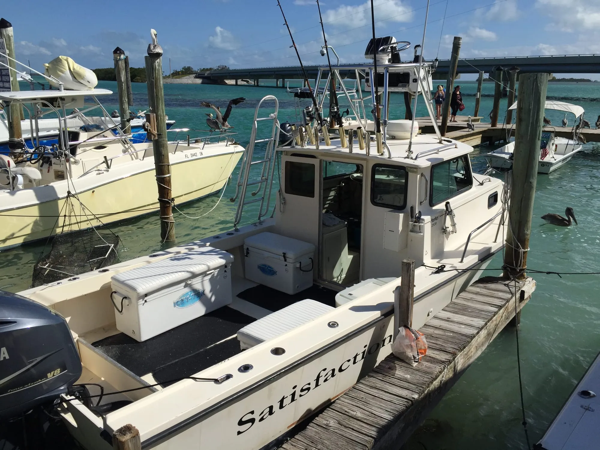Satisfaction, a Parker 2520 pilot house, tied up at the dock in Islamorada